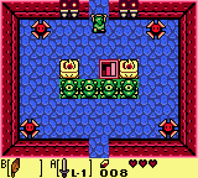 Still frame: Link stands at the top doorway of a blue-floored dungeon room, the door to the Tail Cave boss.