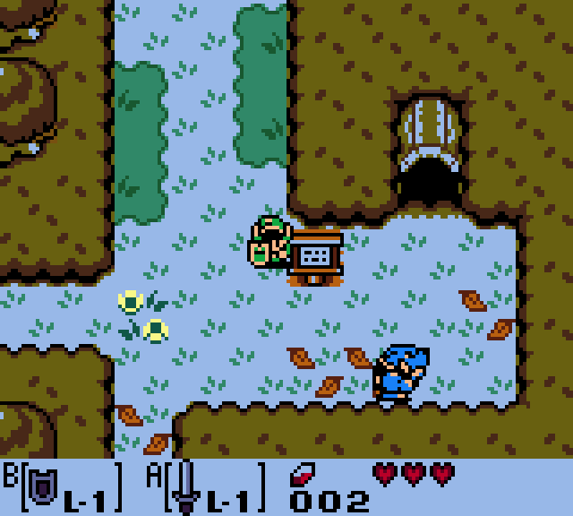 Still frame: a forest screen with a signpost in the middle. Link is next to the sign, a Moblin is below, and the cave door is at the top right.